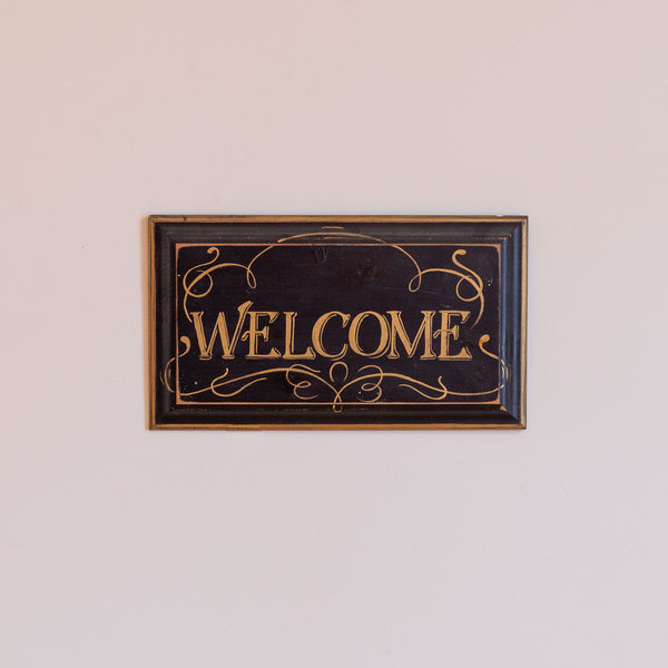 Black Welcome Sign
