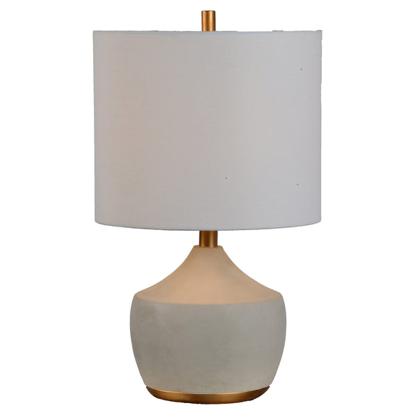 Table lamp with cylinder shade and round base.