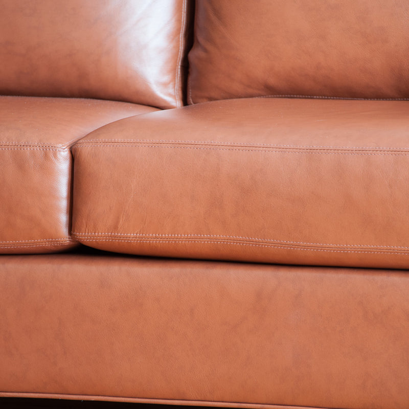 The Holden leather sofa in whisky, closeup