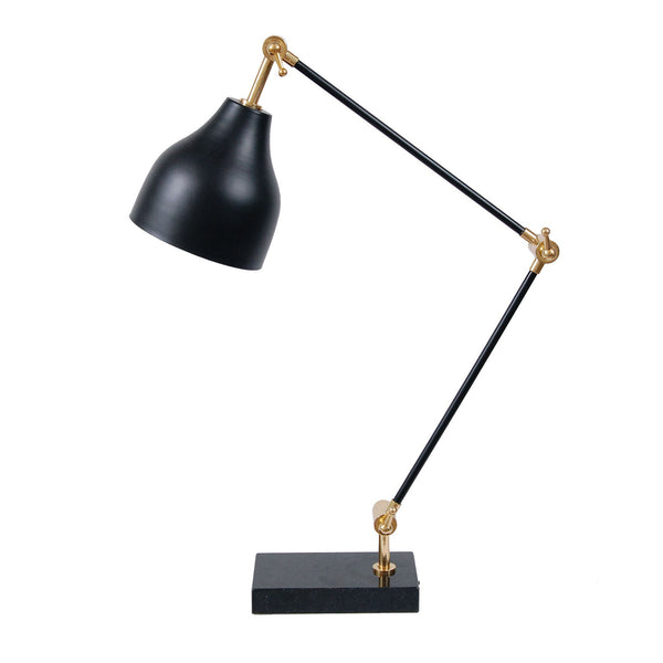 Black brass table lamp with gold accents.
