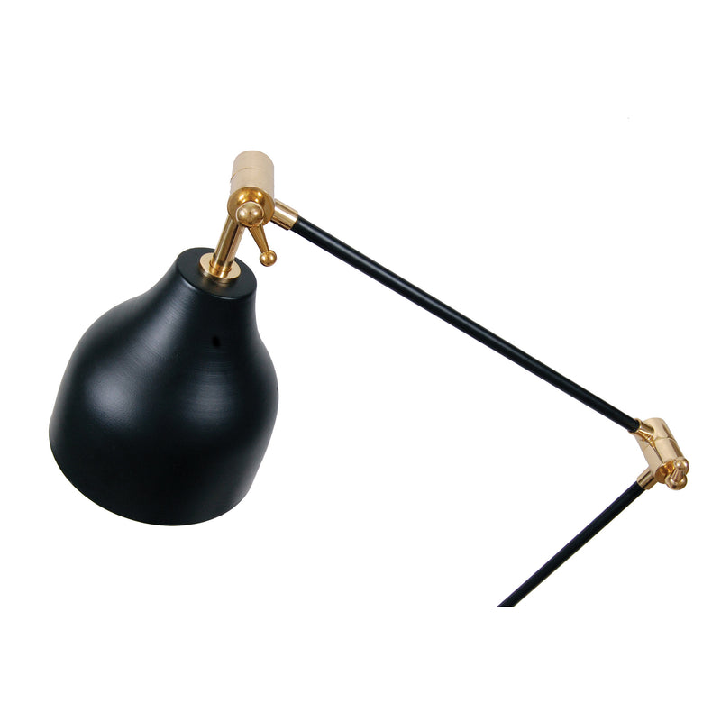 Black brass table lamp with gold accents.