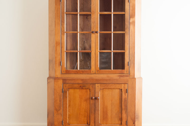 Owen's Glazed Corner Cabinet in Williams Light